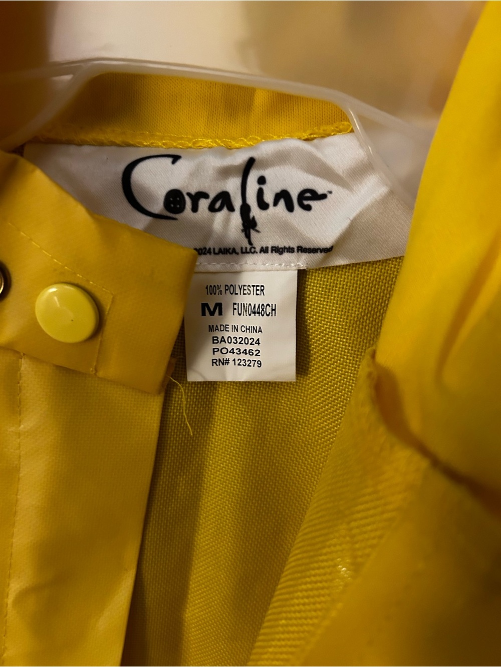 Coraline yellow raincoat kids M 8/10